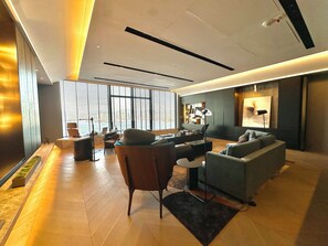 Skyline Suite | Living area | 55-inch flat-screen TV with cable channels, TV - The Connaught (Hong Kong)