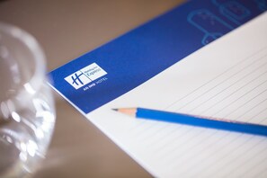 A hotel brochure with a logo and the name "Hunting Hotel". - Holiday Inn Express Amsterdam - South by IHG (Amsterdam)