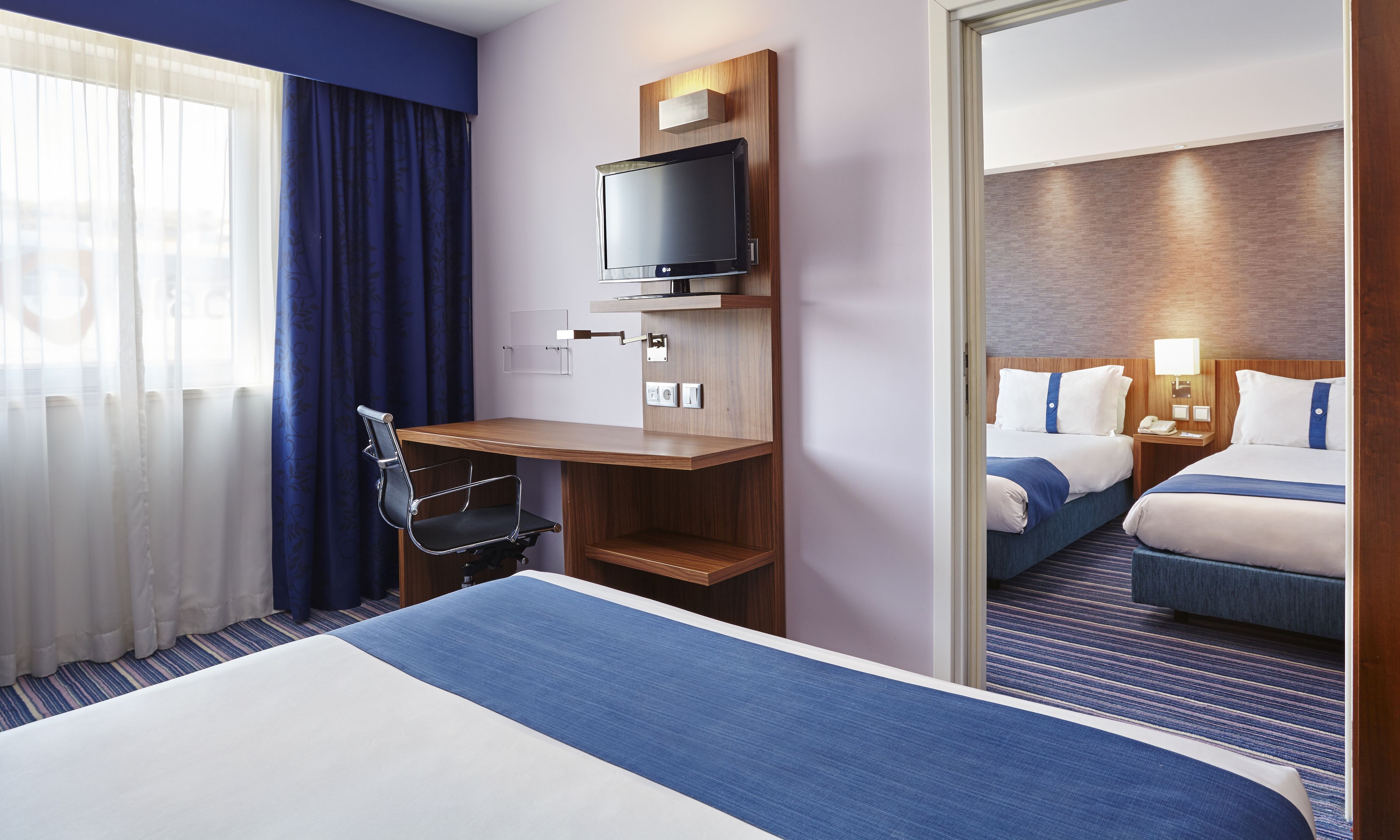 desk, blackout curtains, soundproofing, iron/ironing board