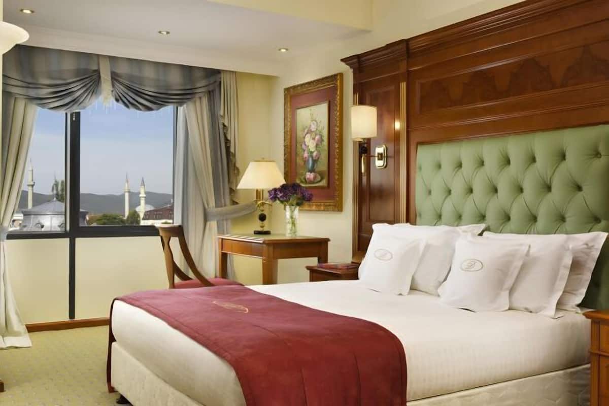Frette Italian sheets, premium bedding, down duvets, minibar