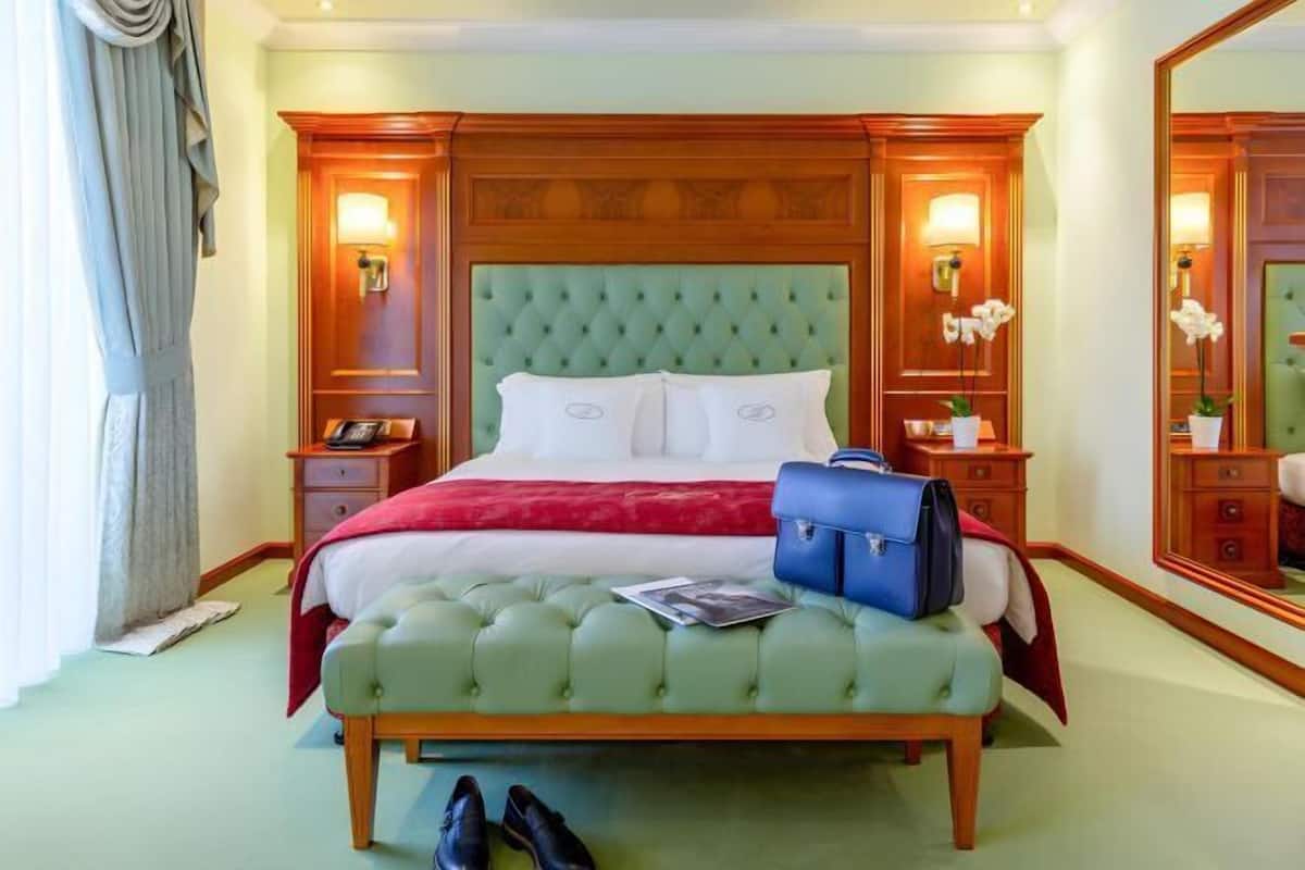 Frette Italian sheets, premium bedding, down duvets, minibar
