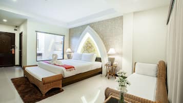 Habitación Deluxe | Minibar, escritorio, cunas gratuitas y camas extra