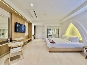 Ivory Deluxe Room | Een minibar, extra bedden, gratis wifi, beddengoed
