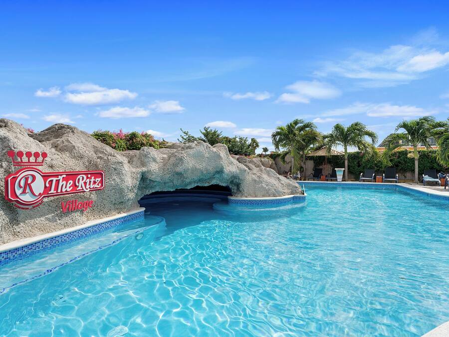 2 outdoor pools, open 7:00 AM to 10:00 PM, pool umbrellas, sun loungers