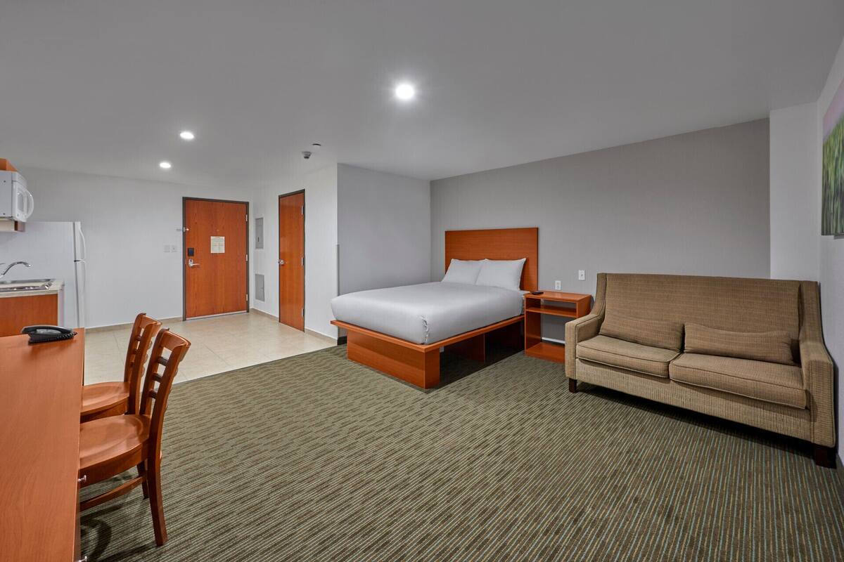 Desk, blackout drapes, alarm clocks, bed sheets