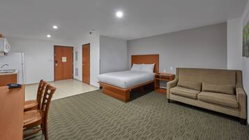 Desk, blackout curtains, bed sheets, alarm clocks