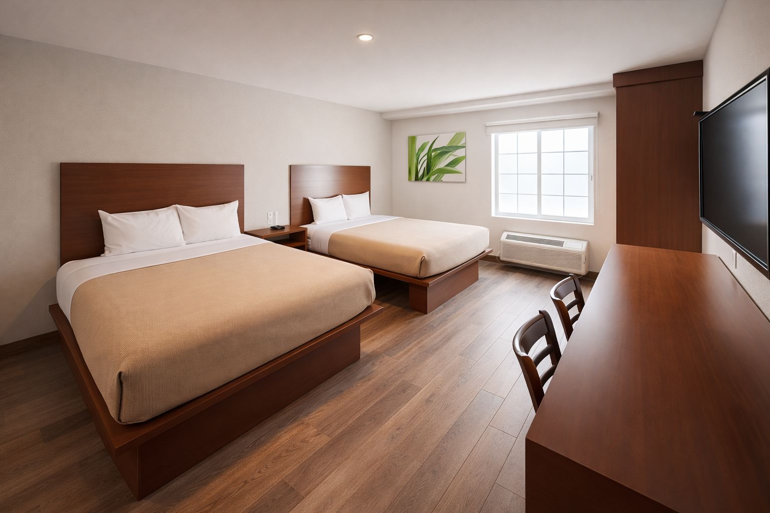Habitación de hotel con dos camas, un escritorio, un televisor y una ventana con una planta.