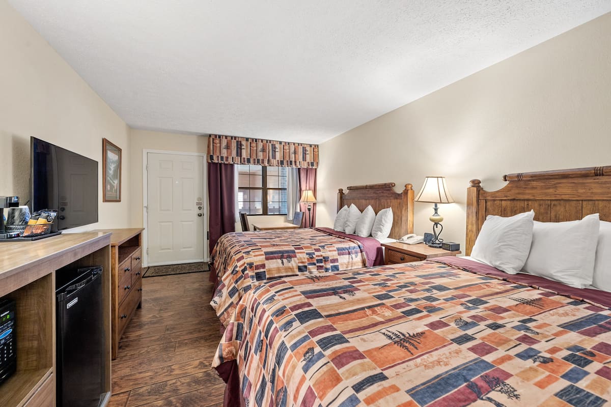 Pillow-top beds, blackout curtains, iron/ironing board, free WiFi