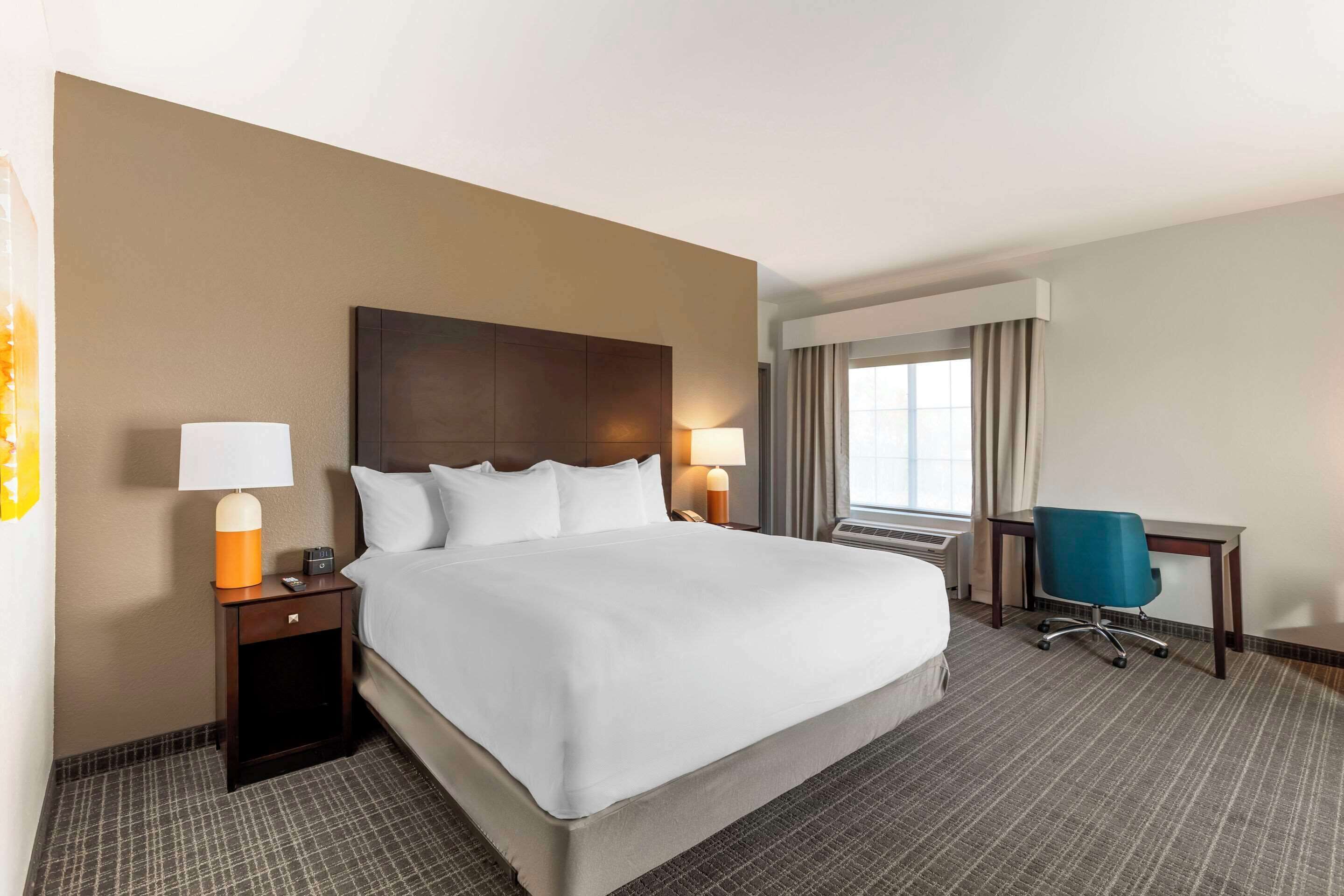 premium bedding, desk, iron/ironing board, rollaway beds