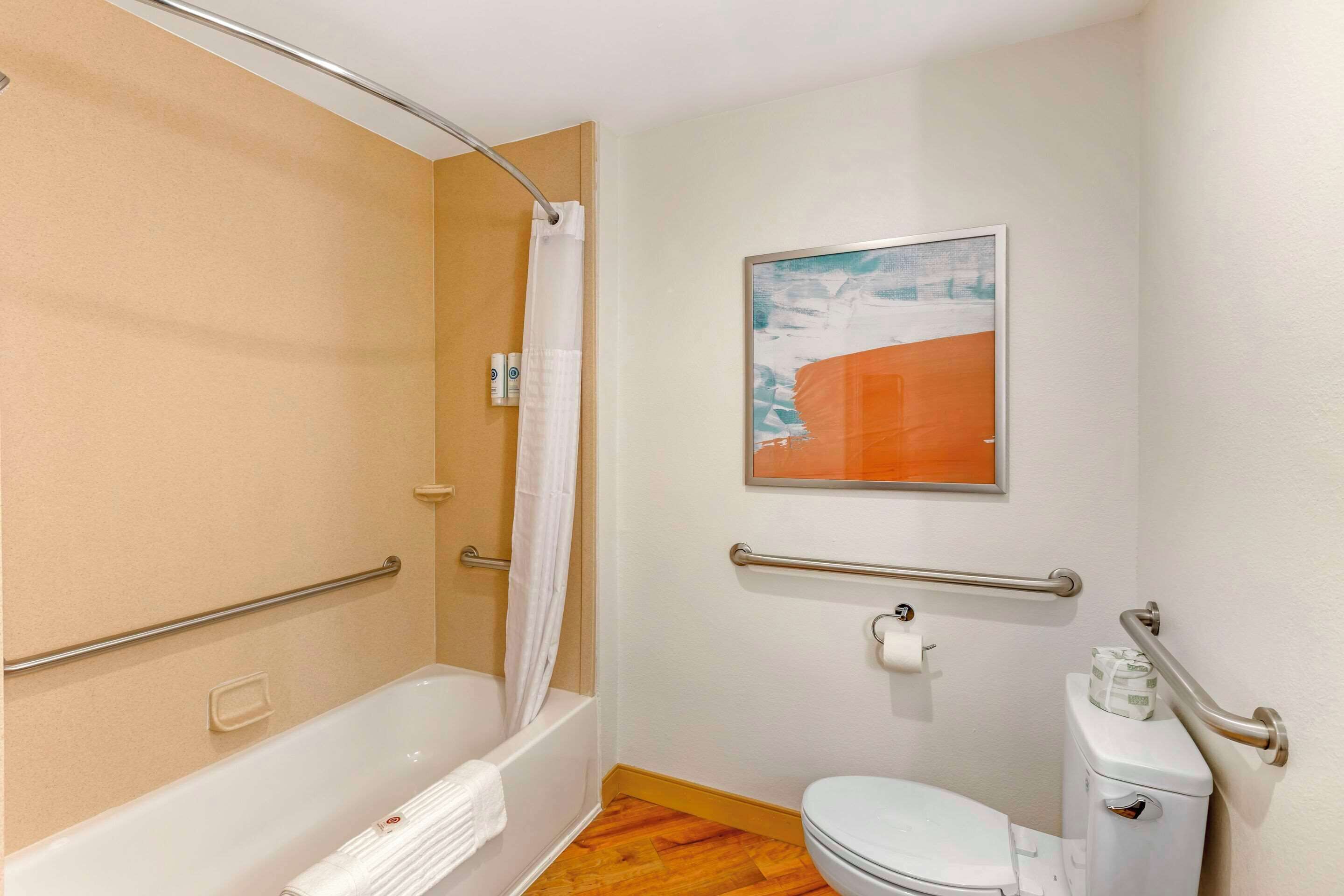 combined shower/bathtub, free toiletries, hair dryer, towels