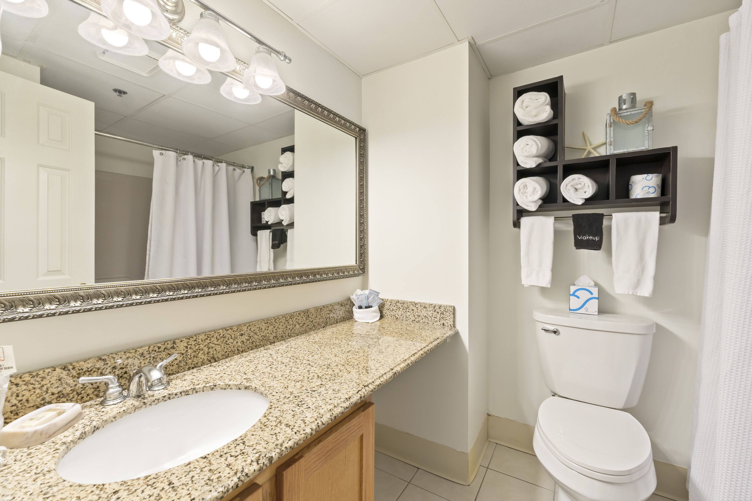 1 bedroom king suite | bathroom | hair dryer, towels