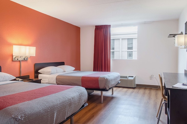 Desk, blackout drapes, WiFi (free), bed sheets