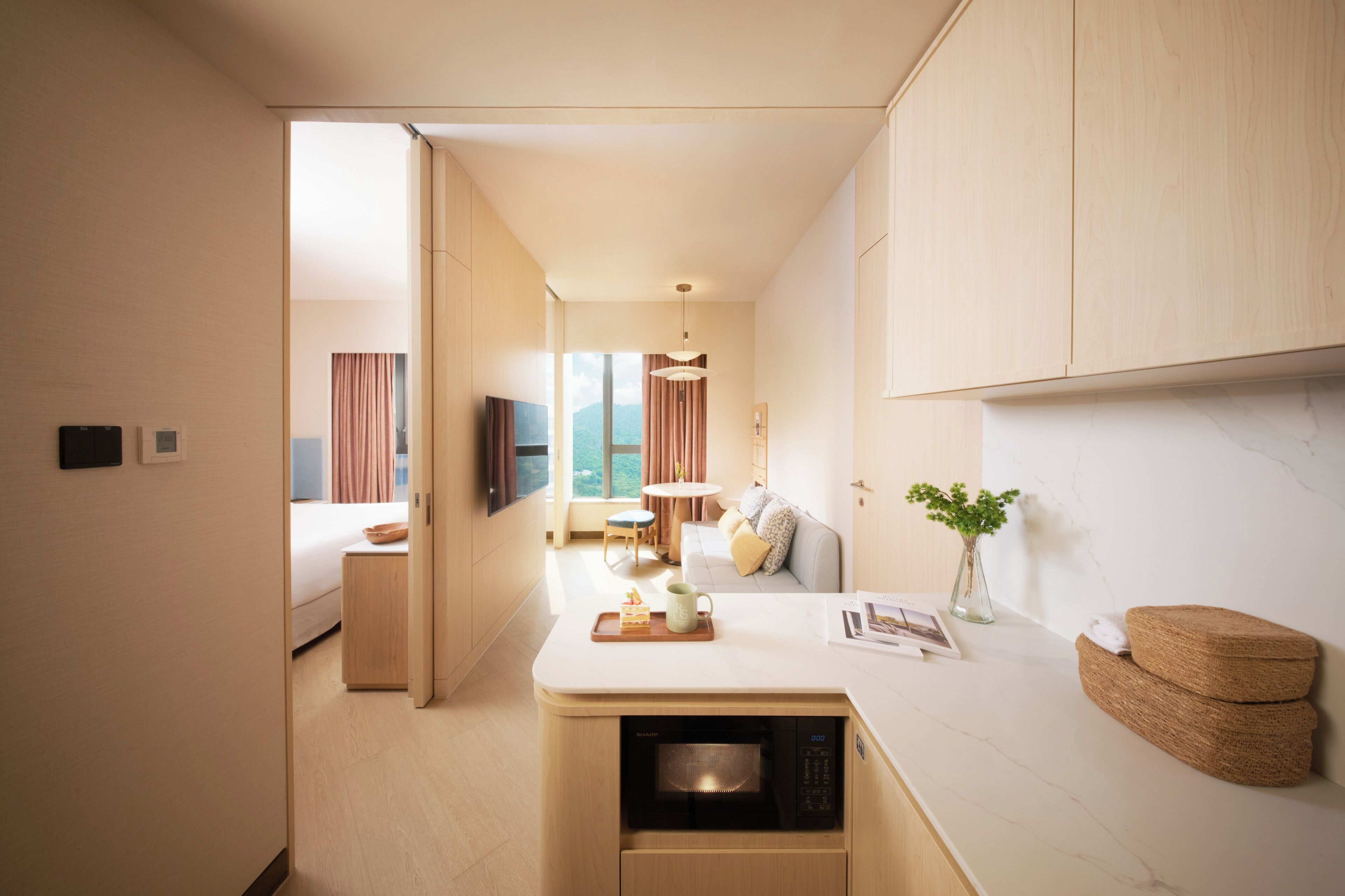 Suite Elite, para no fumadores, vista a la ciudad | Minibar, caja de seguridad en la habitación y escritorio 