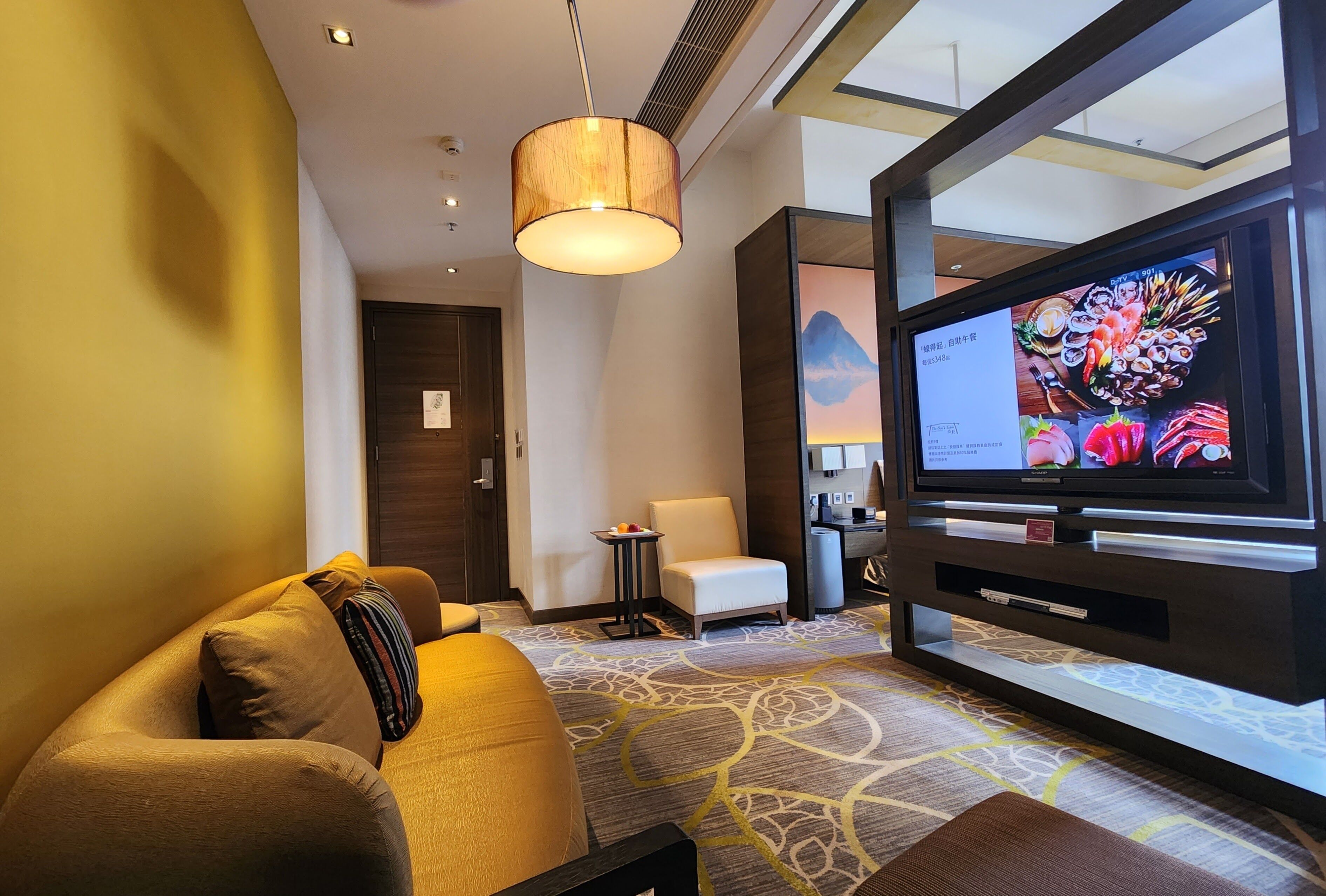 junior suite, 1 king bed, accessible, city view (terrace access) | living area | lcd tv