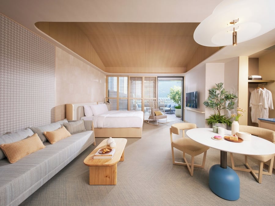 Sunset Terrace Suite | Minibar, in-room safe, desk, blackout curtains