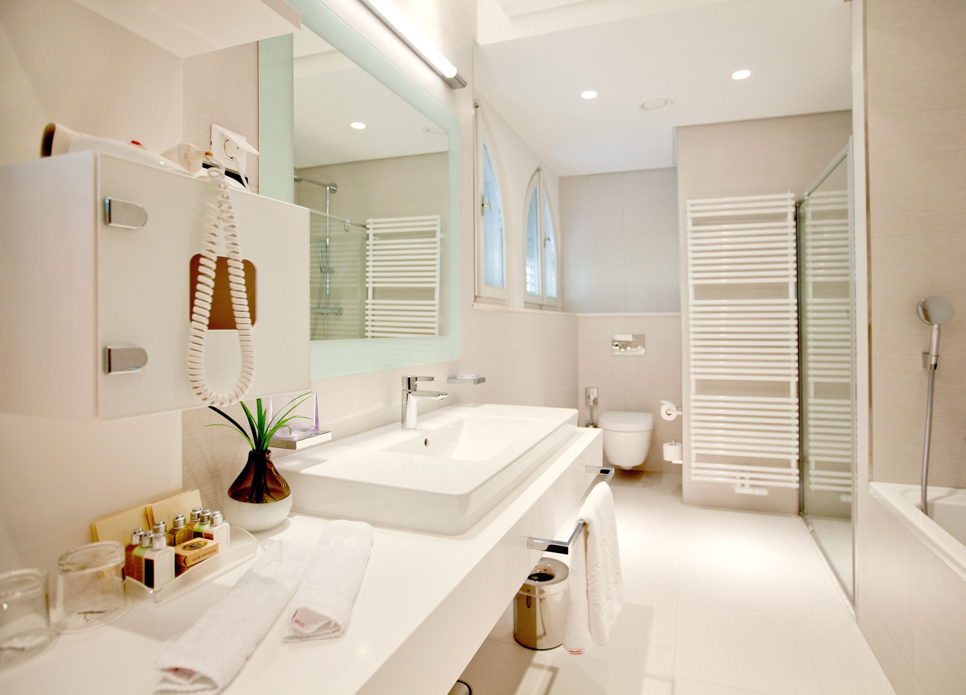 deluxe room, sea view | bathroom | designer toiletries, hair dryer, slippers, towels