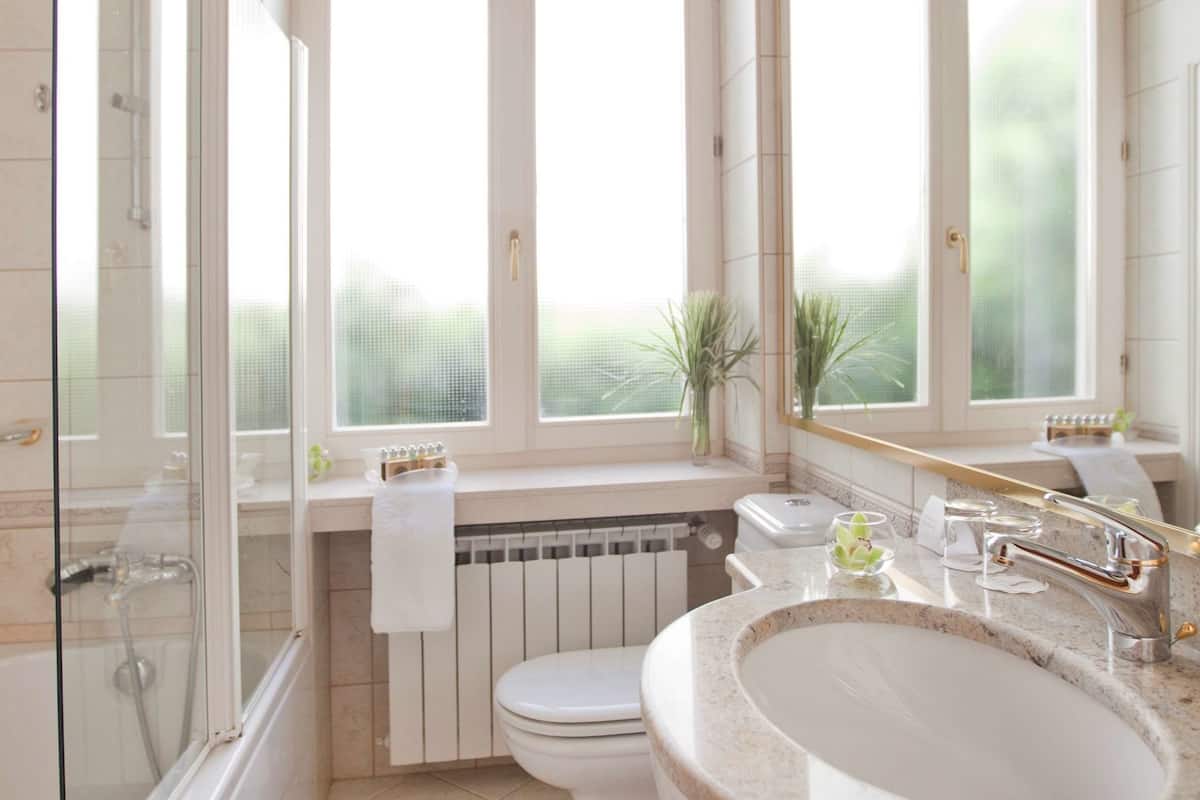 classic double room single use | bathroom | free toiletries, hair dryer, bathrobes, slippers