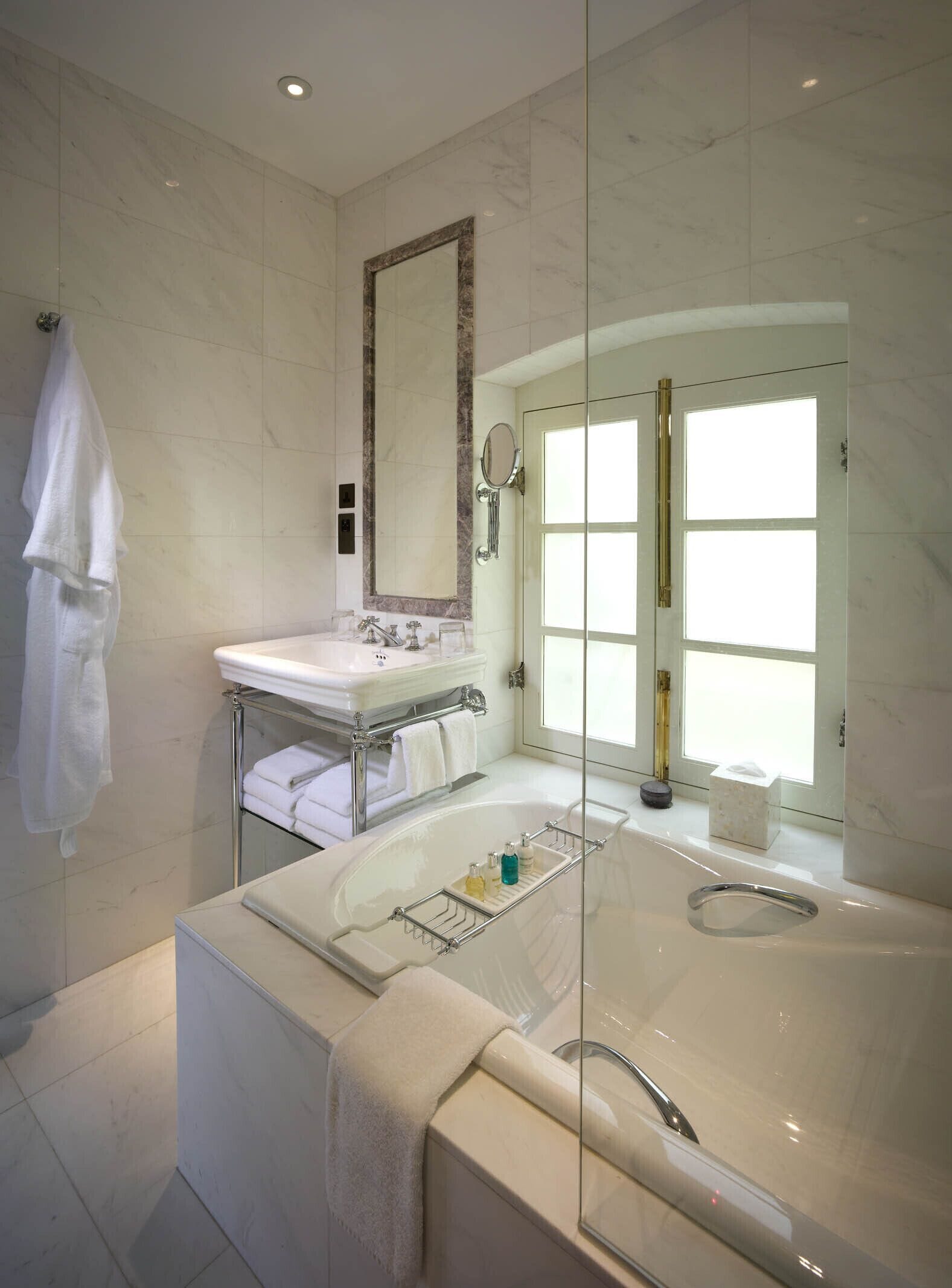 hair dryer, bathrobes, slippers, towels