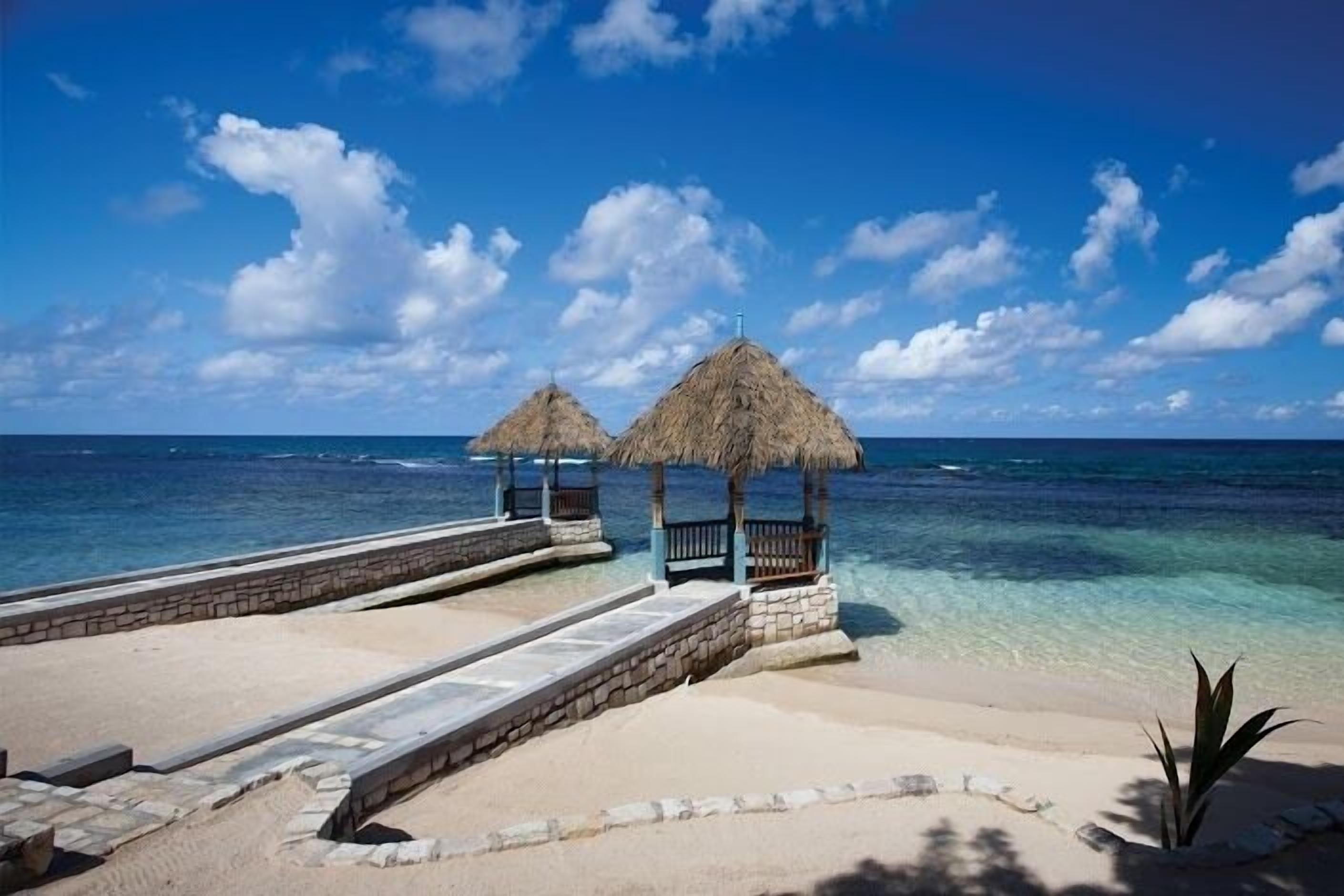 Private beach, sun-loungers, beach towels, beach massages