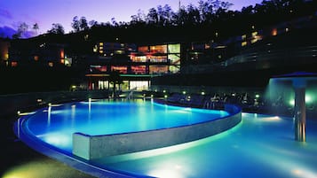 Indoor pool, outdoor pool, pool umbrellas, pool loungers