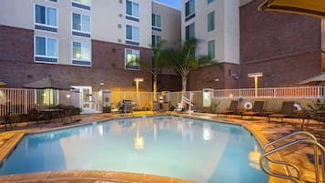 Outdoor pool, open 6:00 AM to 10:00 PM, pool umbrellas, pool loungers