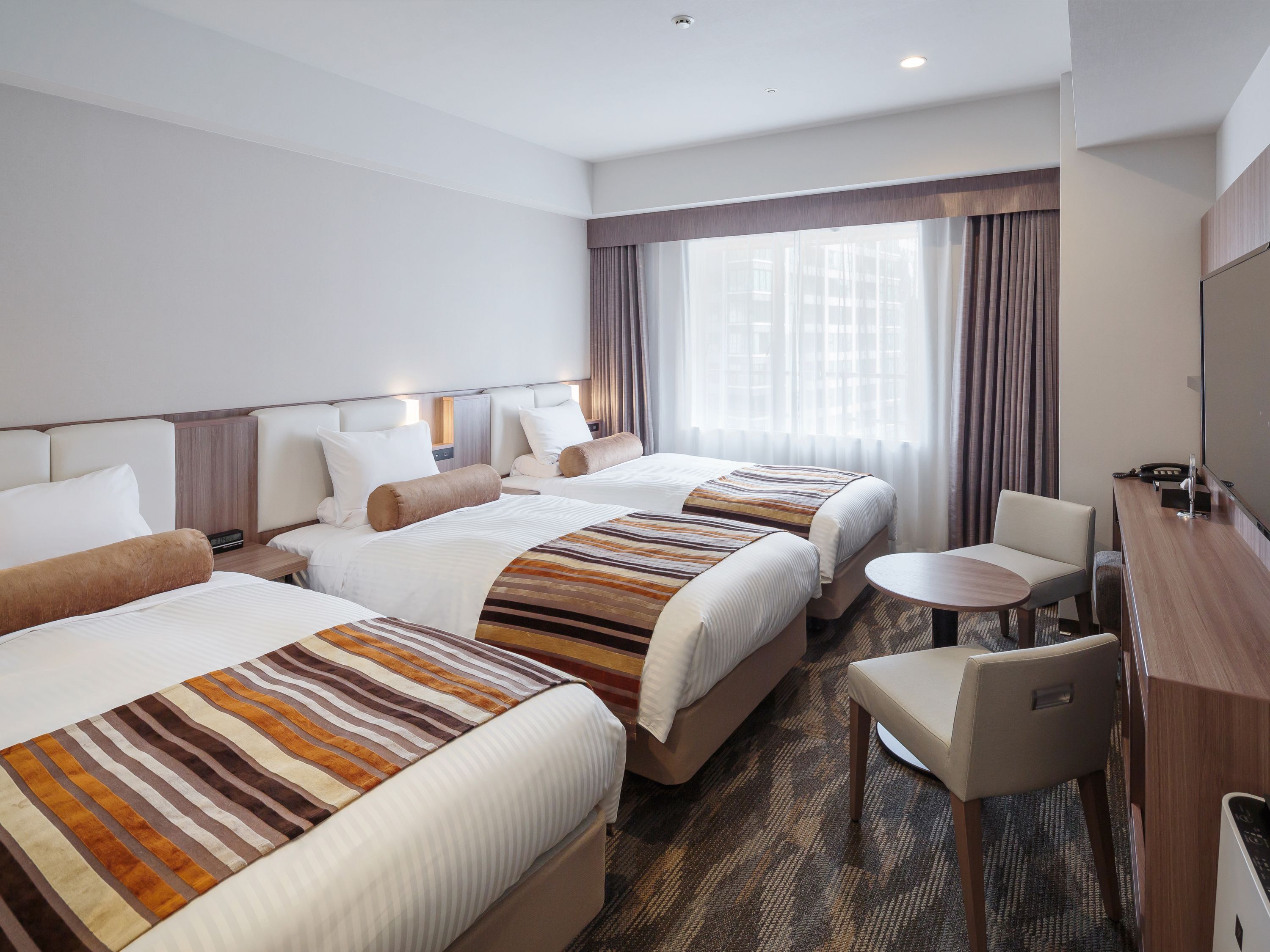 Premium bedding, down duvets, in-room safe, desk