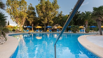 Indoor pool, outdoor pool, pool umbrellas, sun loungers