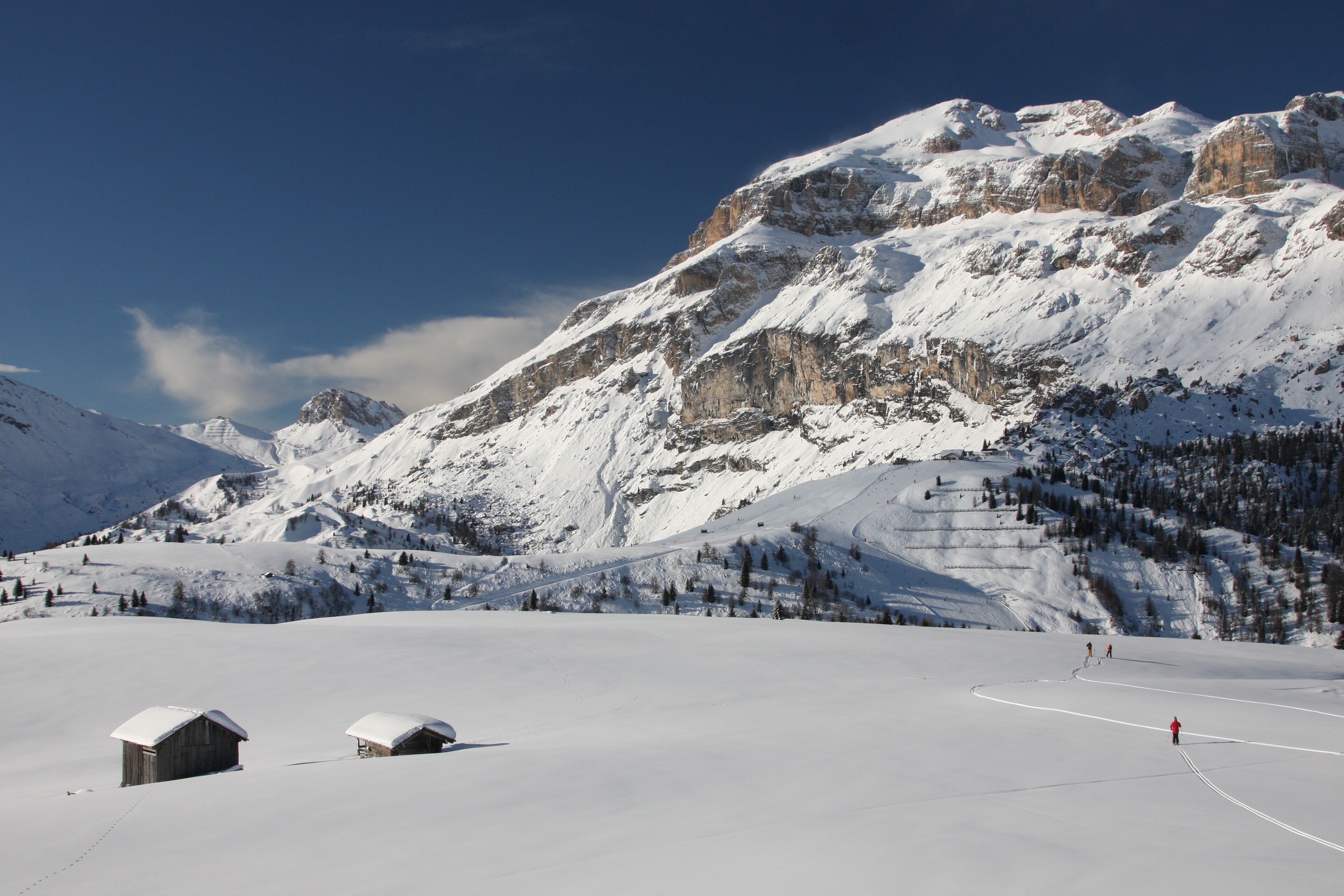 A snow-covered mountain landscape with a clear sky.