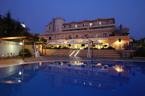 Seasonal outdoor pool, pool umbrellas, pool loungers