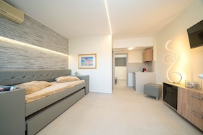 Apartment, 1 Schlafzimmer | Zimmersafe, schallisolierte Zimmer, kostenloses WLAN, Bettwäsche
