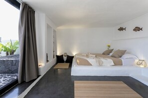 Exclusieve suite, 1 kingsize bed, privébadkamer, aan tuin | Luxe beddengoed, donsdekens, verduisterende gordijnen, gratis wifi