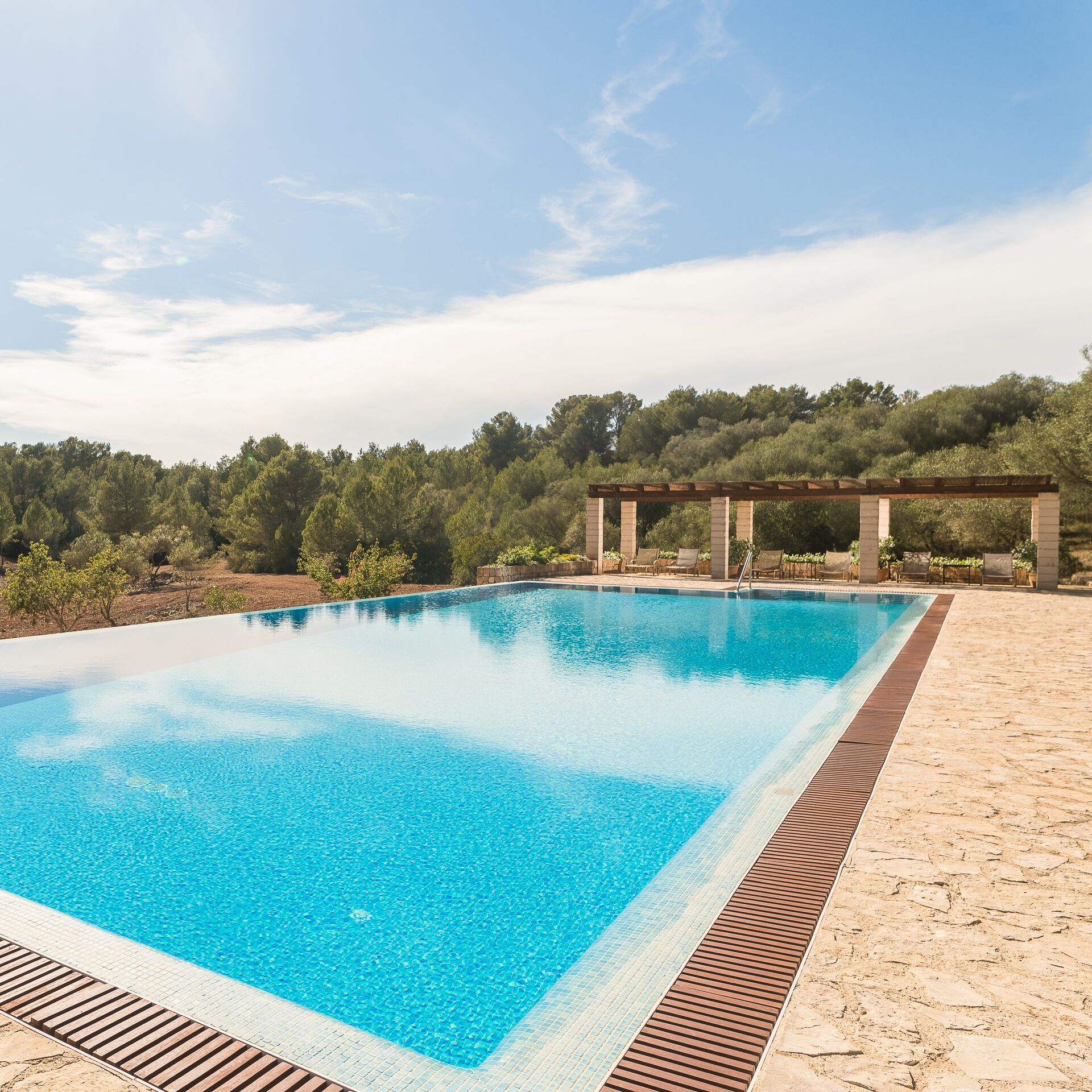 indoor pool, outdoor pool, pool umbrellas, pool loungers