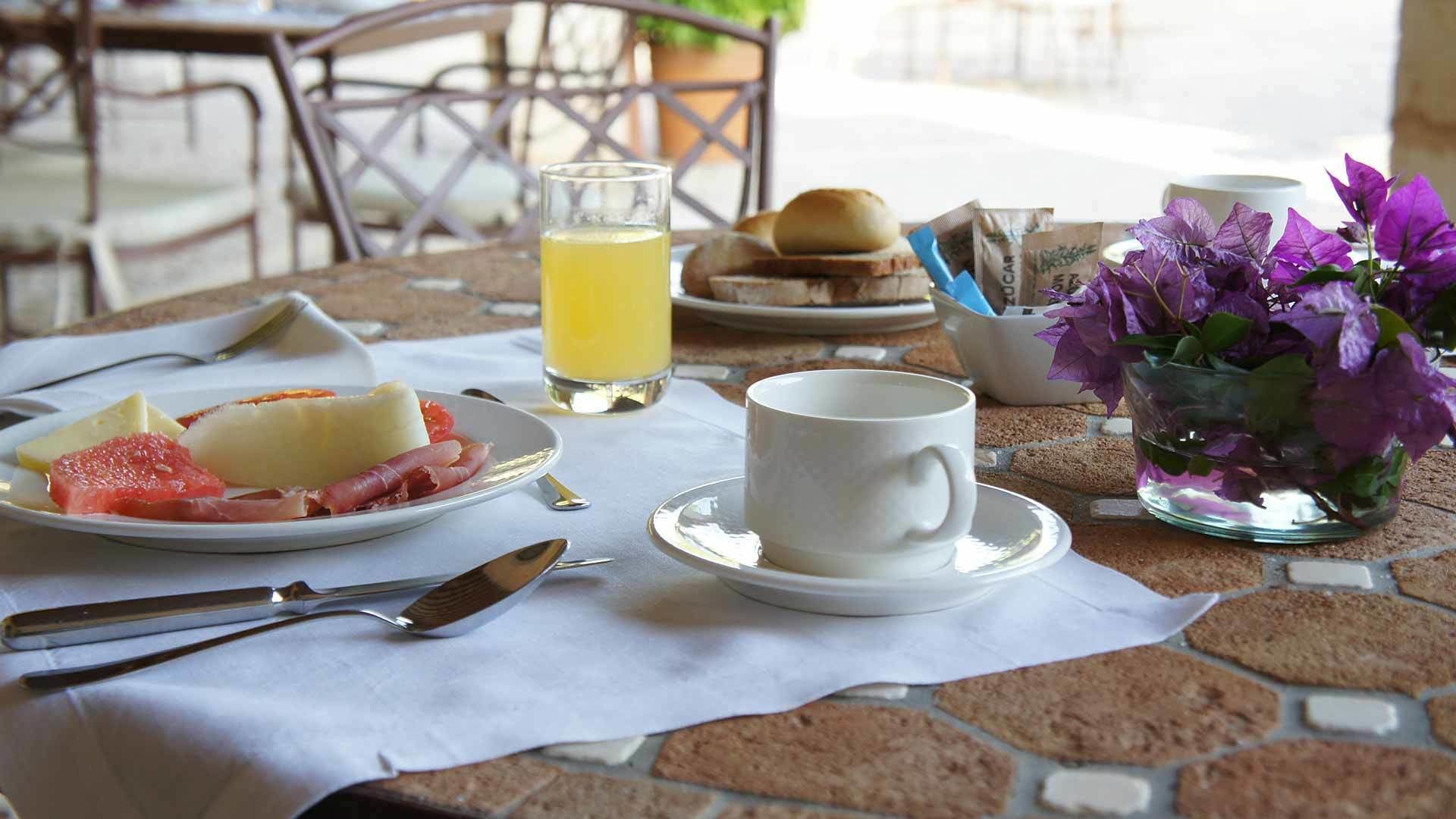 breakfast, lunch, dinner served; mediterranean cuisine, garden views