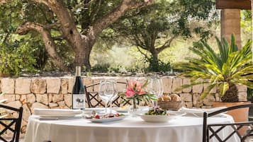 Breakfast, lunch, dinner served; Mediterranean cuisine, garden views