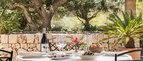 Breakfast, lunch, dinner served; Mediterranean cuisine, garden views