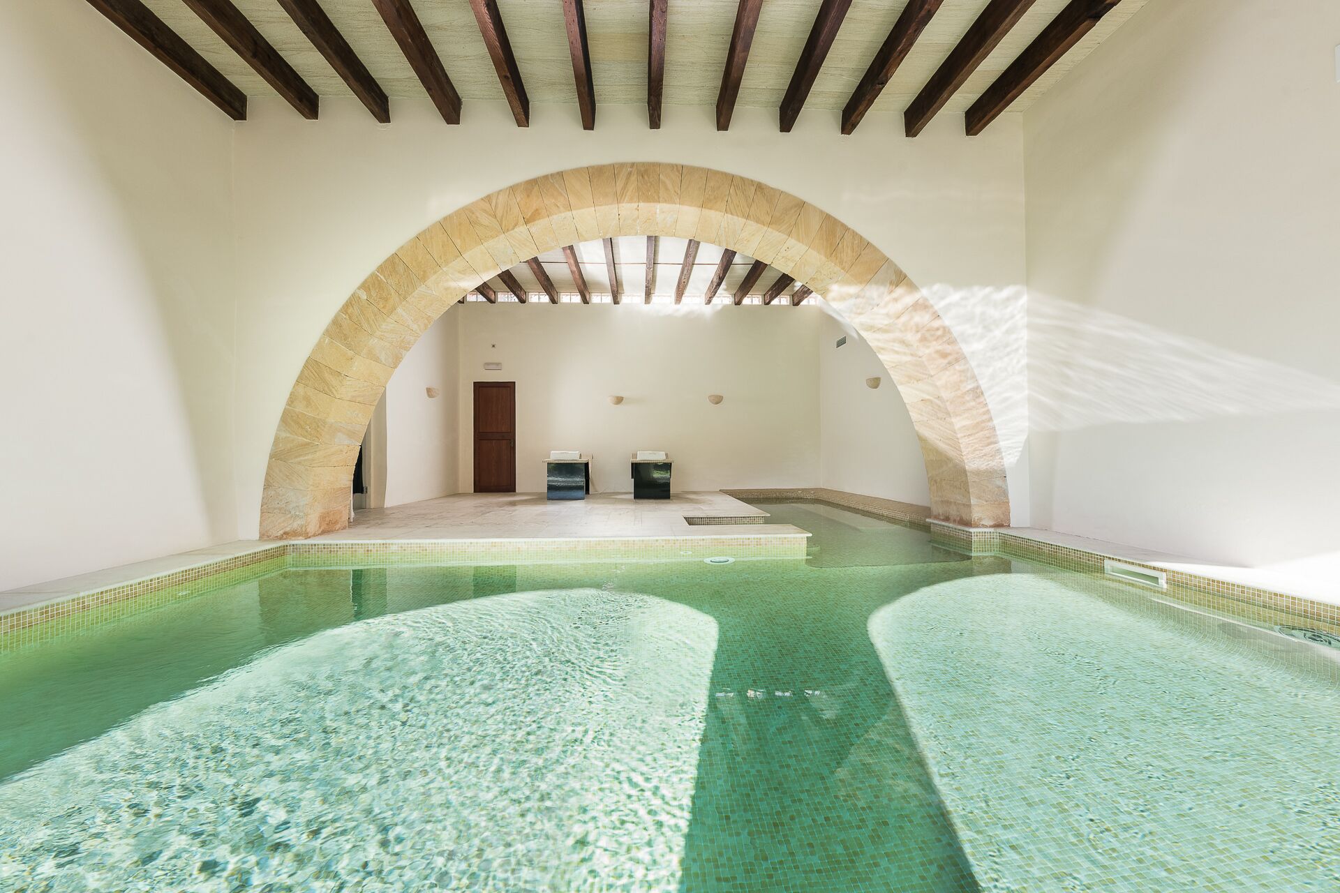 Indoor pool, outdoor pool, pool umbrellas, sun loungers