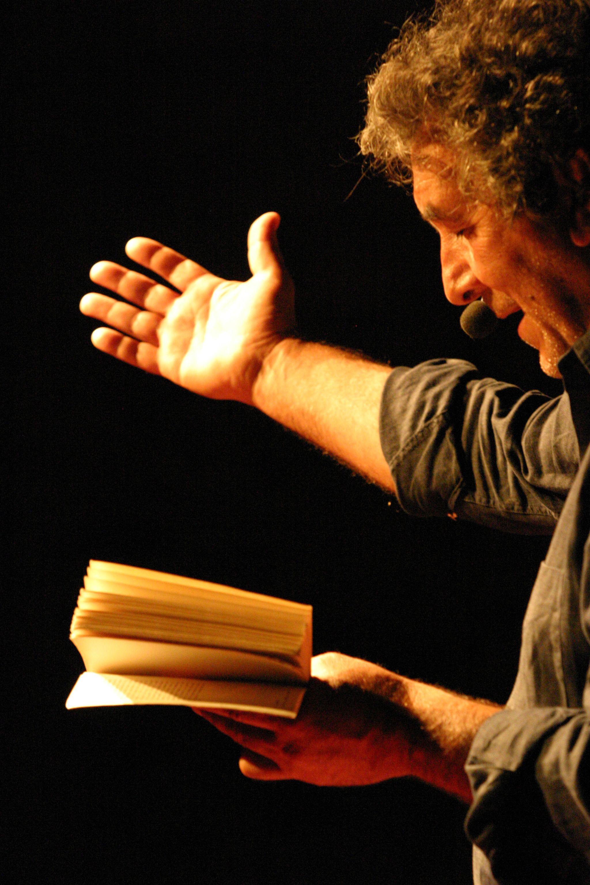 A person holding a book.
