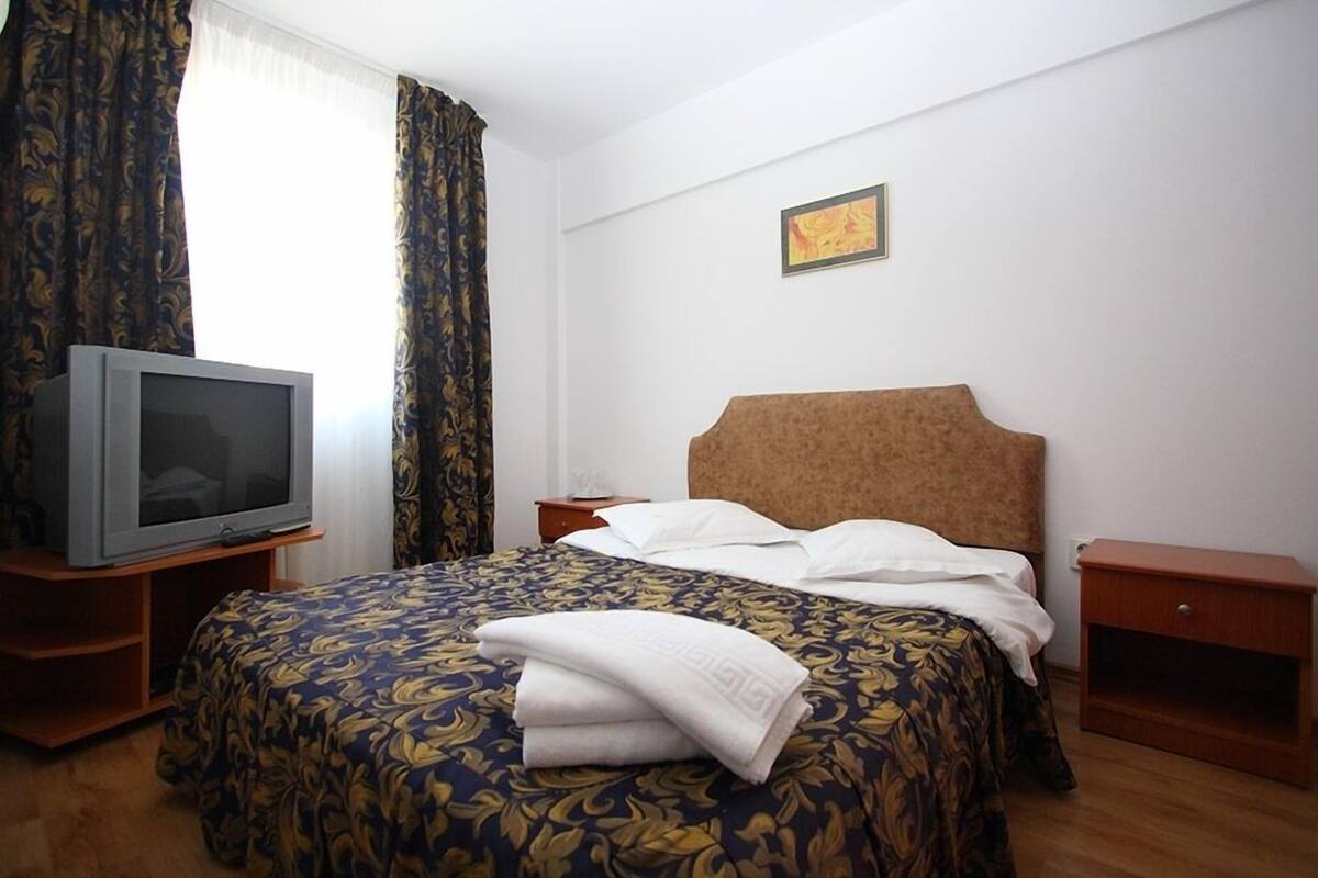 Tweepersoonskamer | Een kluis op de kamer, extra bedden, gratis wifi