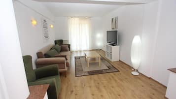 Superior Suite | Living room | Flat-screen TV