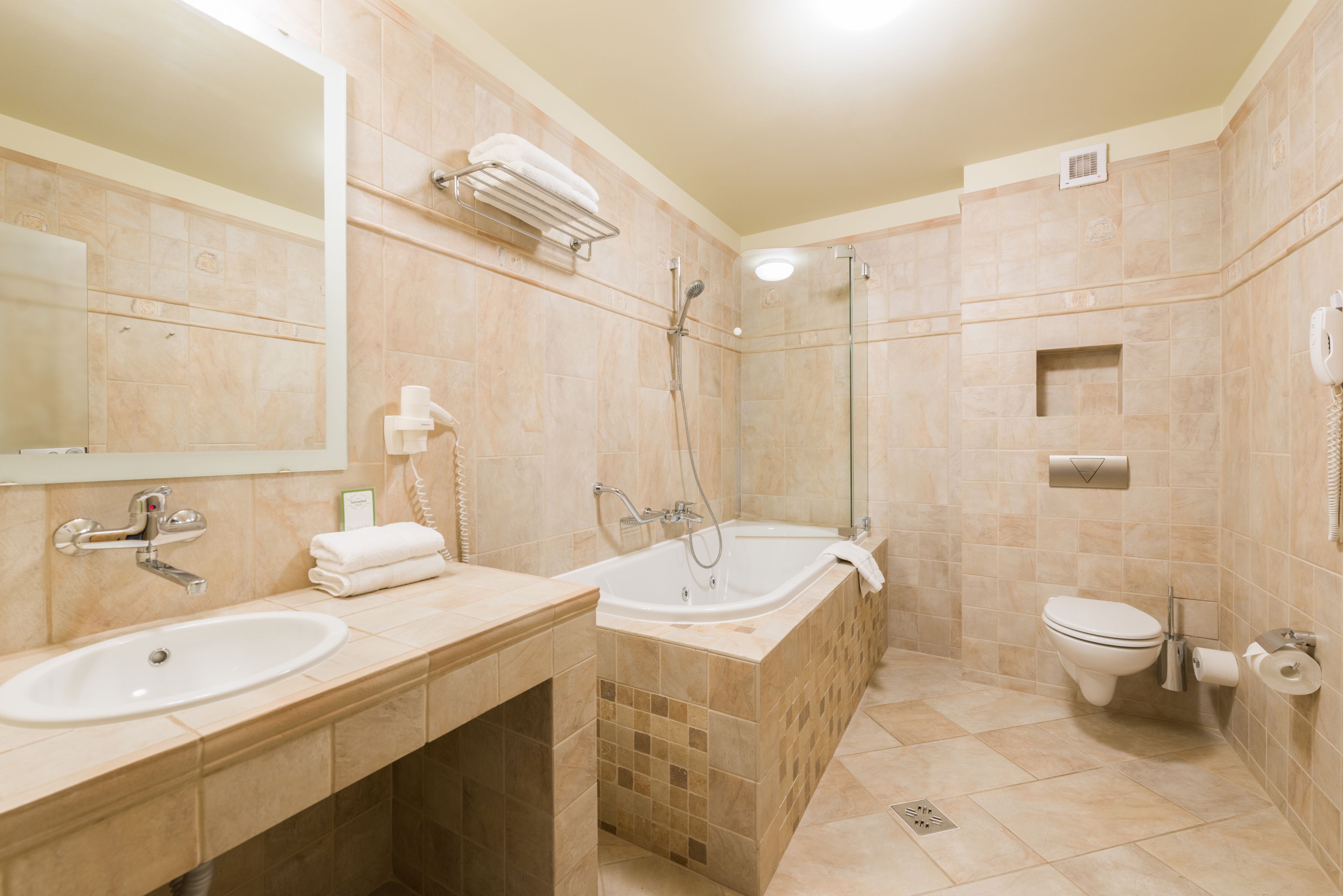 hair dryer, bathrobes, slippers, towels