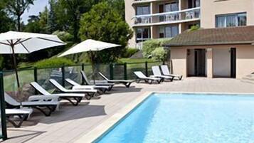 Outdoor pool, open 8:30 AM to 9:00 PM, pool umbrellas, pool loungers