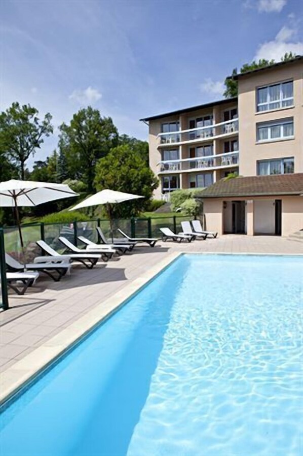 Outdoor pool, open 8:30 AM to 9:00 PM, pool umbrellas, pool loungers