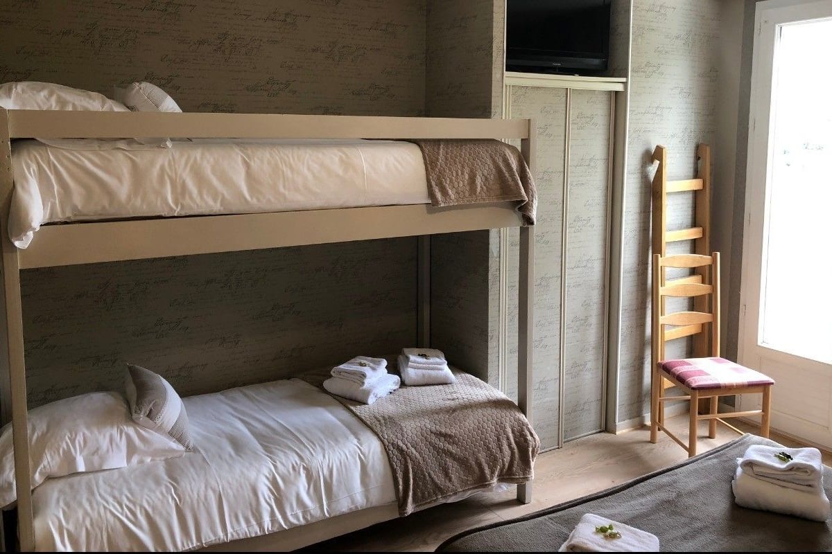 Comfort vierpersoonskamer, uitzicht op tuin | Een bureau, gratis wifi, beddengoed