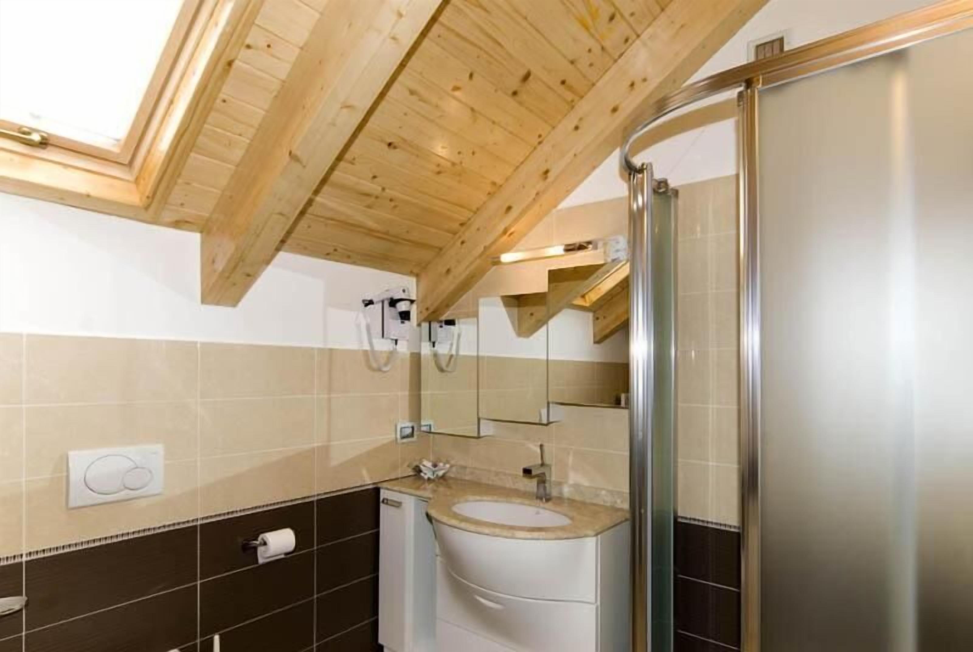 jetted bath, rainfall showerhead, free toiletries, hair dryer