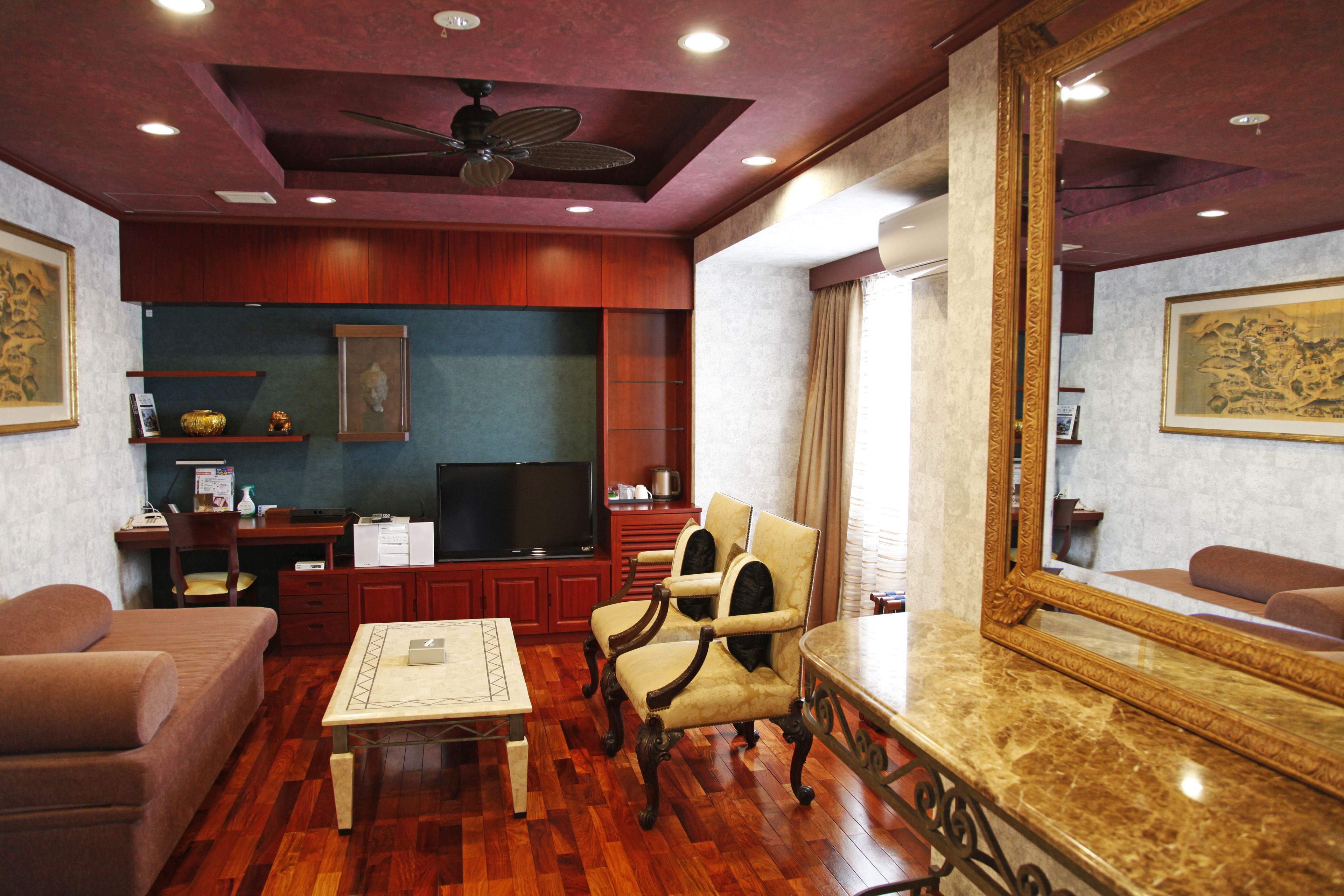 junior suite room, non smoking | living area | lcd tv