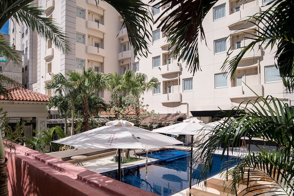 Seasonal outdoor pool, open 10:00 AM to 8:00 PM, free pool cabanas