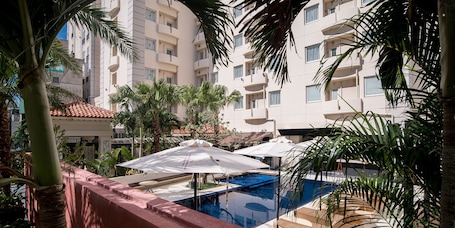 Seasonal outdoor pool, open 10:00 AM to 8:00 PM, free cabanas