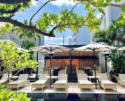 Seasonal outdoor pool, open 10:00 AM to 8:00 PM, free cabanas