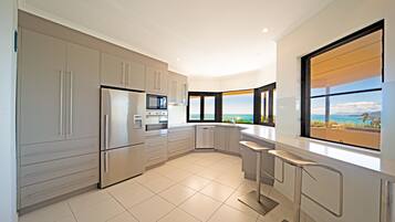 Three Bedroom Ocean View Penthouse | Private kitchen | Full-size fridge, microwave, oven, stovetop
