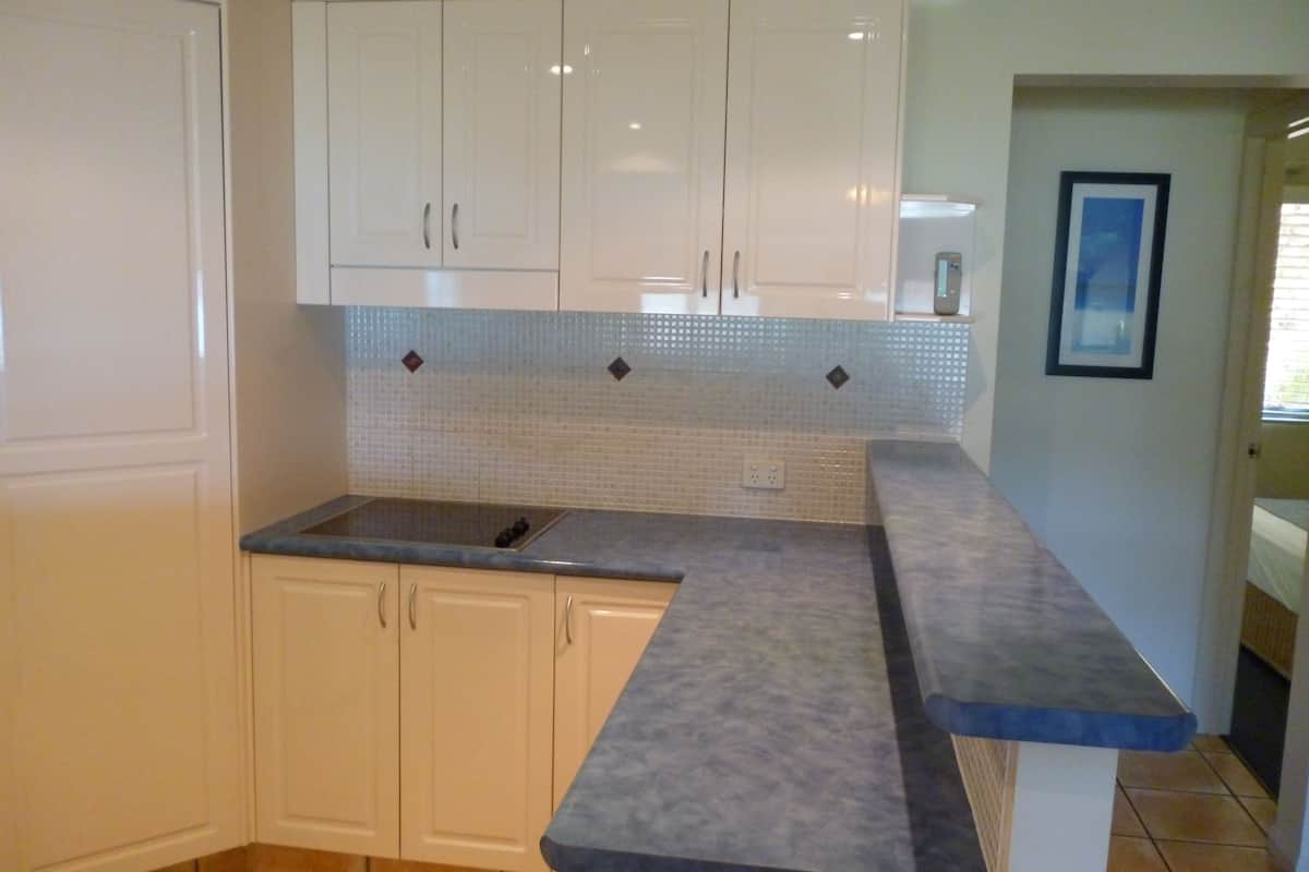 three bedroom ocean view apartment with rooftop hot tub | private kitchen | full-sized fridge, microwave, oven, stovetop